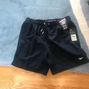 Black swim trunks.  Never been worn.